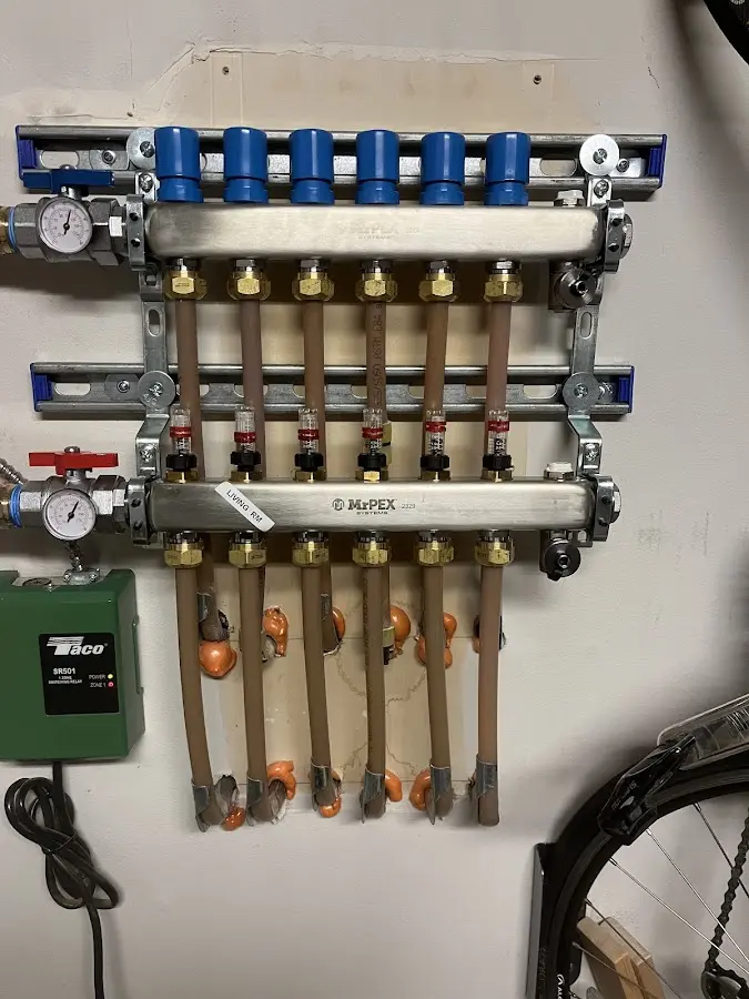 Plumber performing Gas Line Installation at a residential property in Highland Beach